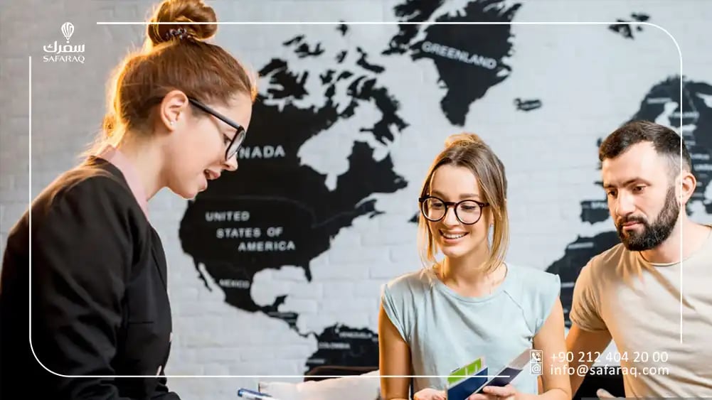 travel agent planning a trip for customers