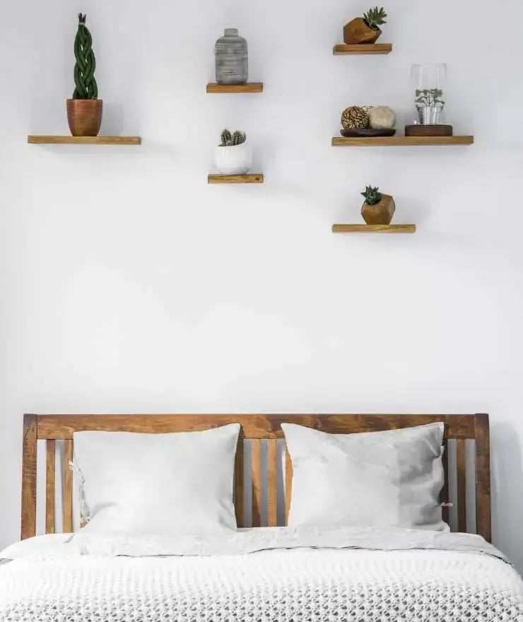 floating shelves over bed