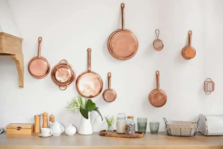 hang some decorative plates in the kitchen